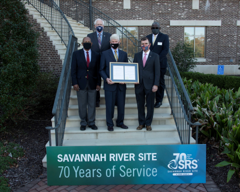 State Sen. Tom Young and State Rep. Bill Taylor bestow a Senate resolution designating Savannah River Site Day in South Carolina on Nov. 28, 2020.