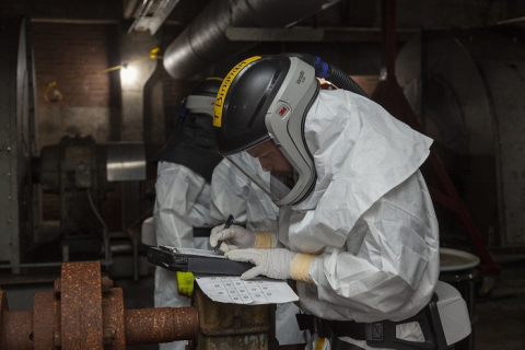 EM crews have transitioned from the successful completion of core cleanup at the East Tennessee Technology Park to projects at the Oak Ridge National Laboratory and Y-12 National Security Complex. Pictured are workers performing deactivation activities inside Manhattan Project-era facilities at Y-12.
