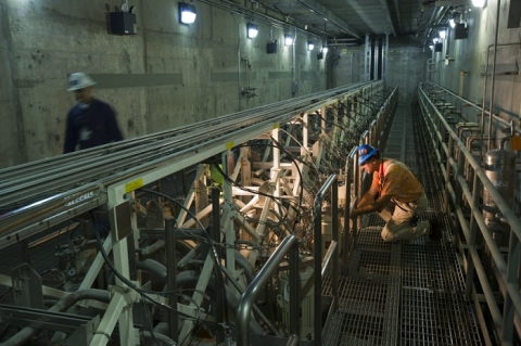 An employee works on the contactor operating deck within the Salt Waste Processing Facility