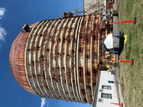Crews prepare the Experimental Gas-Cooled Reactor for deactivation. The eight-story facility at the Oak Ridge National Laboratory stands 216 feet tall.