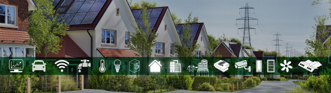 a row of tract houses with identical solar panels on their roofs