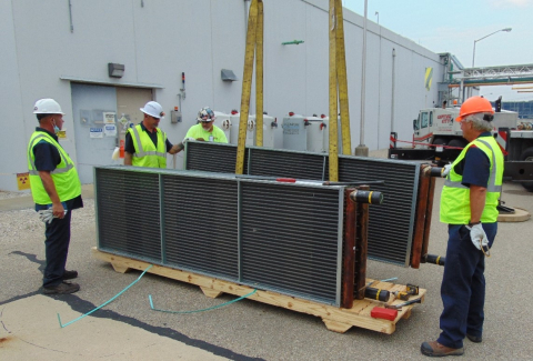 From left, Carl Rogers, Paul Mathews, and Gary Grega, from Mid-America Conversion Services subcontractor American Mechanical Group, change the cooling coil out of a heating, ventilation, and air conditioning system at the Portsmouth Depleted Uranium Hexafluoride Conversion facility. Also pictured is Larry Carter with Capital City Crane, at far right. Safety performance includes evaluation of subcontractor work.