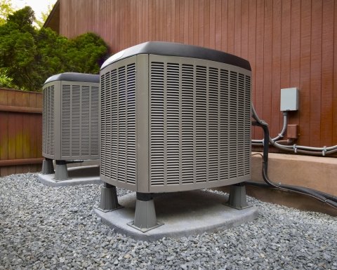 Cold climate heat pump outside a commercial building.