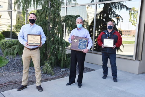 WRPS President and CEO John Eschenberg, and Lead WRPS Union Safety Representative Jason Green pose with National Safety Council awards recognizing WRPS’ safety performance.