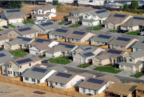 Aerial photo of rooftops in the Premier Gardens Zero Energy Home Community. Each house is built with a 2.2 kilowatt photovoltaic system.