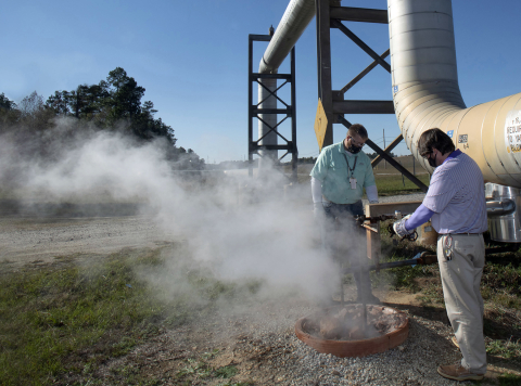 Brad Clark, Savannah River Nuclear Solutions (SRNS) operations support specialist, left, and Andrew Ellsworth, SRNS maintenance coordinator, inspect a steam trap.