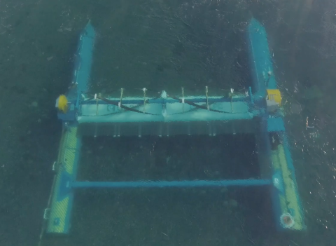 ORPC’s RivGen Power System submerged in the water.