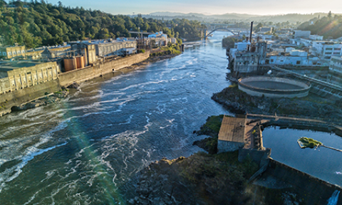 A river flowing through an industrial area.