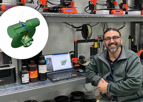 David Young, owner of Warehouse Guitar Speakers, displays on his computer screen the earpiece design his company produced for EM’s Paducah Site to help fill a safety-supply chain gap. Pictured in the upper-left corner of the photo is a close-up view of the earpiece design.