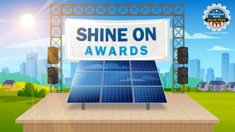 Photovoltaic solar panels on a stage under a banner that says Shine On Awards