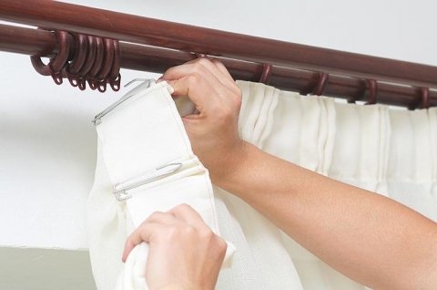 Drapes being hung