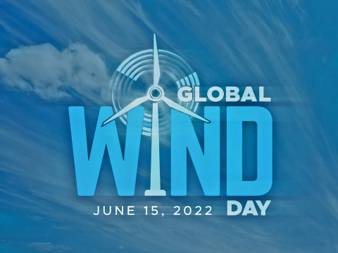 A blue banner says “Global Wind Day” with a turbine icon in the center.