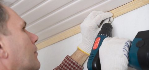 Man using a cordless drill