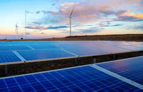 The sun sets upon the Flatirons Campus of the National Renewable Energy Laboratory, lighting up the 1MW photovoltaic array, the Siemens 2.3MW wind turbine, and the Gamesa 2MW wind turbine.