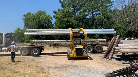 Construction equipment moving poles