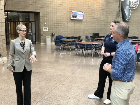 Columbia Basin College President Rebekah Woods, left, and student ambassador Megan Holm, center, lead Washington River Protection Solutions President and Project Manager Wes Bryan on a tour of the college campus in Pasco, Washington.