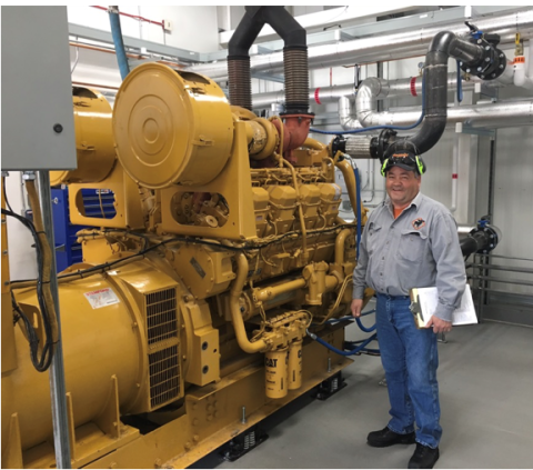A generator at left with an operations manager at right.