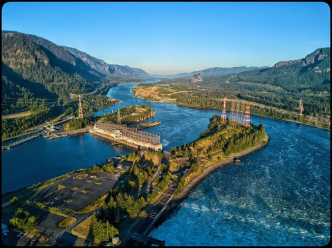 a photo of a river and a dam