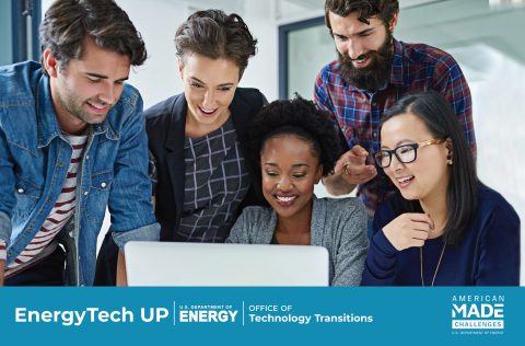 Group of people look at computer together