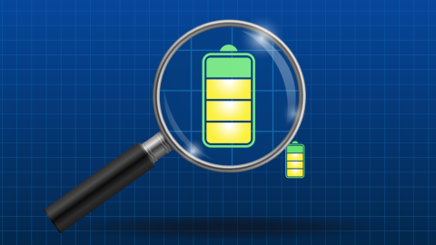 A magnifying glass looking at a battery icon