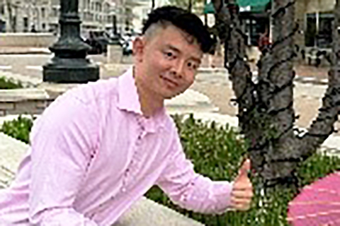 A portrait of Chris Dinh.