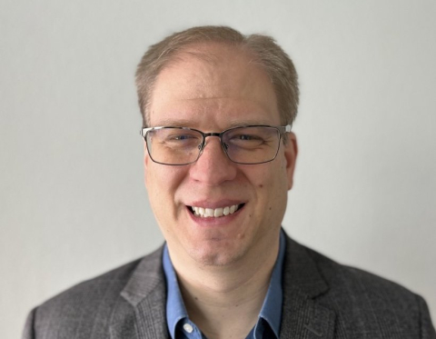 Jason Jonkman smiles at the camera.