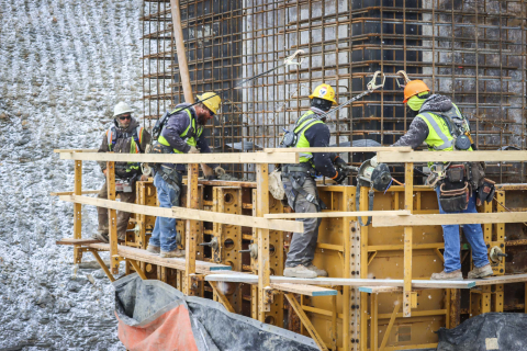Fluor-BWXT Portsmouth crews pour concrete for a valve house at the On-Site Waste Disposal Facility at the Portsmouth Site. Valve houses are structures containing mechanical piping necessary to control leachate flow from an active disposal cell. They also provide a means to access a leak detection system for monitoring.
