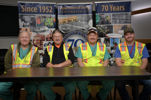 The Osborne Brothers work together as uranium material handlers at EM's Portsmouth Site in Ohio. From left are David, Randy, Rick and Rick's son, A.J., an industrial hygienist.