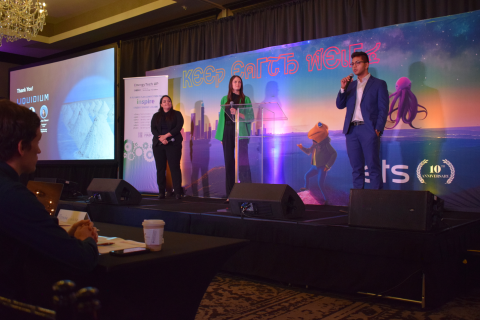 Liquidium team presenting their technology pitch at the event