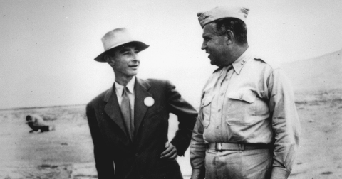 J. Robert Oppenheimer and Gen. Leslie Groves in conversation.