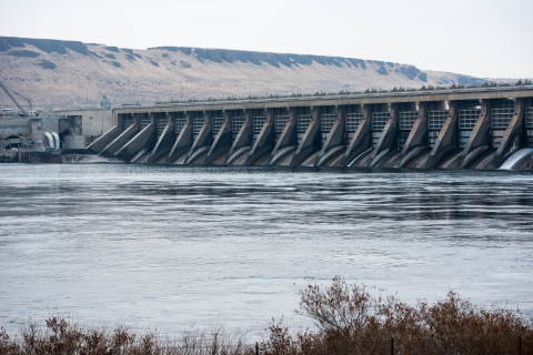 View of a river with a hydropower dam. 