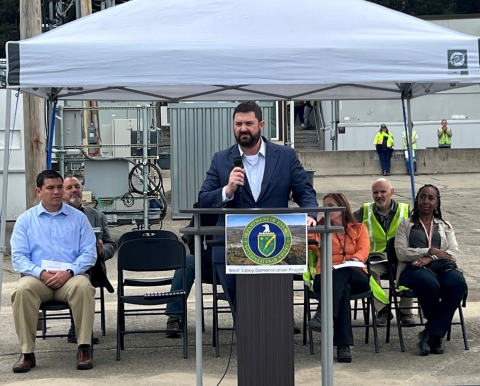 Jeff Avery at outdoor podium speaking to West Valley workforce