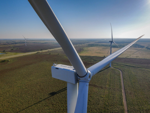 Wind turbine in an open field