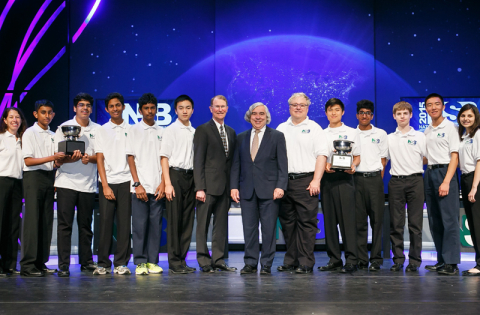 Secretary of Energy Dr. Ernest J. Moniz and Under Secretary for Science and Energy Dr. Franklin Orr, pose for a photo with (from left) the 2015 National Science Bowl high school and middle school champions.