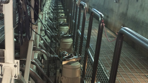 An up close shot of parts of a machine inside a facility building