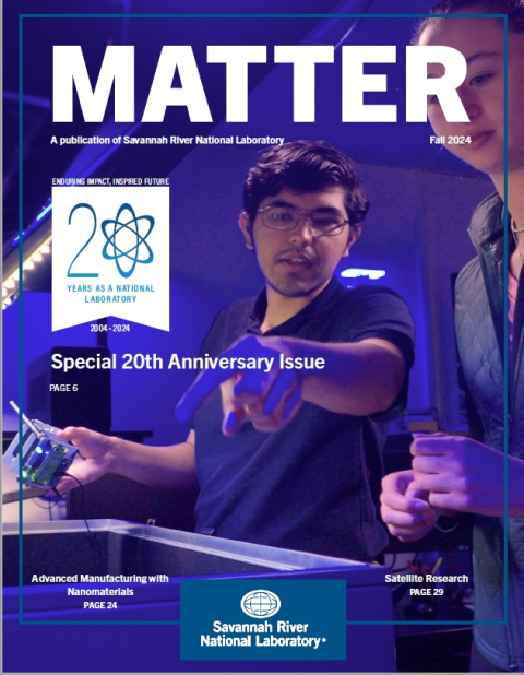 A magazine cover with the word "Matter" written boldly in white at the top and the cover photo includes two scientists working in a lab