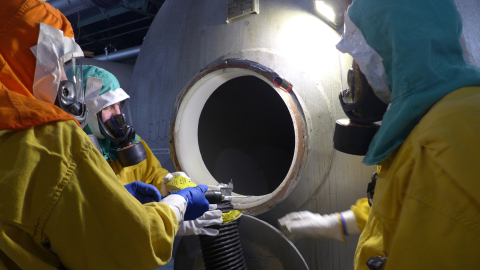 Deactivation crews collect samples from one of 42 storage tanks in the Paducah Site’s C-333 Process Building.