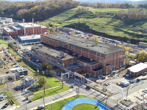 An aerial view of a large brick facility building