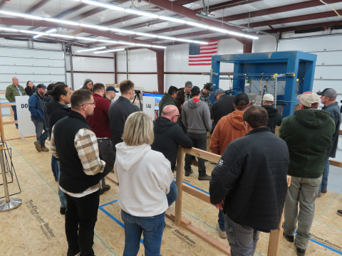 Hanford stand in line to view the proposed full-scale mock-up.