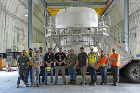Oak Ridge Office of Environmental Management team members used a multi-layered containment system to safely ship processed waste out of state for permanent disposal. It involved packaging a drum containing the waste inside a transportation cask designed to provide shielding and protection during transit.