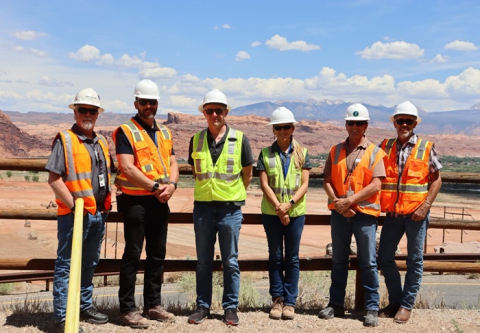 Moab Project team members are pictured with staff members from U.S. Rep. Mike Kennedy’s office in the Moab Project well field.
