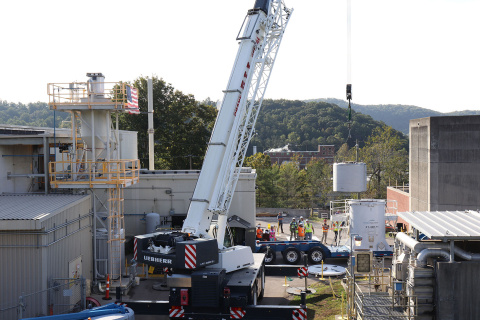 A large white crane carrying out work at the Oak Ridge Site