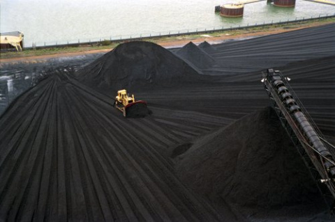 front loader piles coal