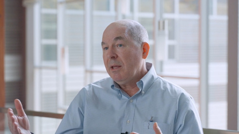 Kurmit Rockwell, Federal Energy Management Program (FEMP) Performance Contracting Team Lead, gestures while speaking about FEMP's performance contracting program.