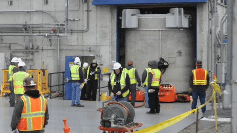 Rotating set of images of a capsule transfer at the Hanford Site
