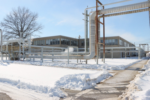 The outside of a large facility building at the Portsmouth Site with snow on the ground