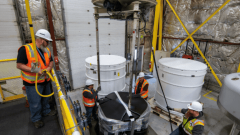 Rotating set of images of a shipment of waste being prepared at the Idaho Site