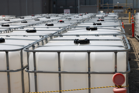 A room full of white containers with silver caging around them at the Idaho Site