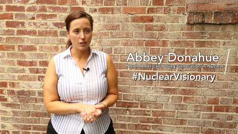 Woman with text that says Abbey Donahue #NuclearVisionary