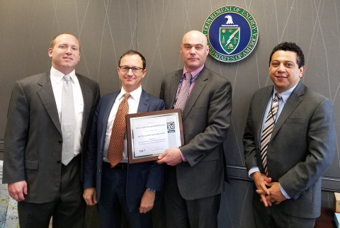 Photo of Sandia researchers receiving plaque at a recent OE ceremony recognizing the R&D 100 awards